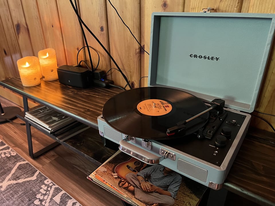 Record player; can Bluetooth to speaker.