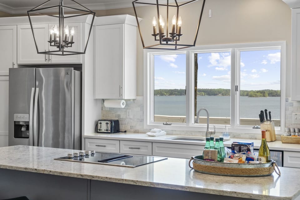 Fully stocked kitchen with amazing lake views.