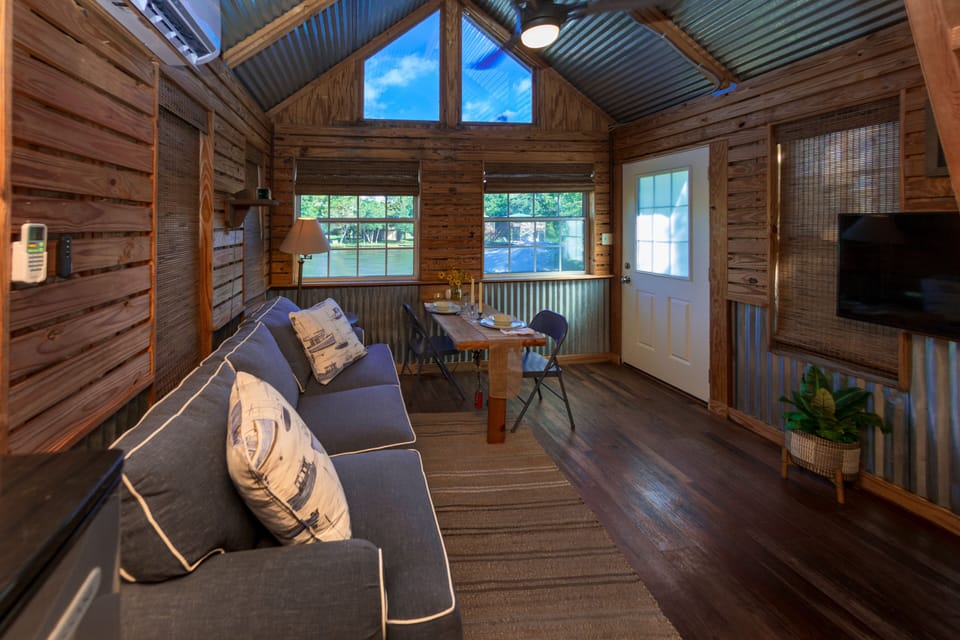 42 inch smart tv. Down filled pullout couch. Fold down space saving table. 