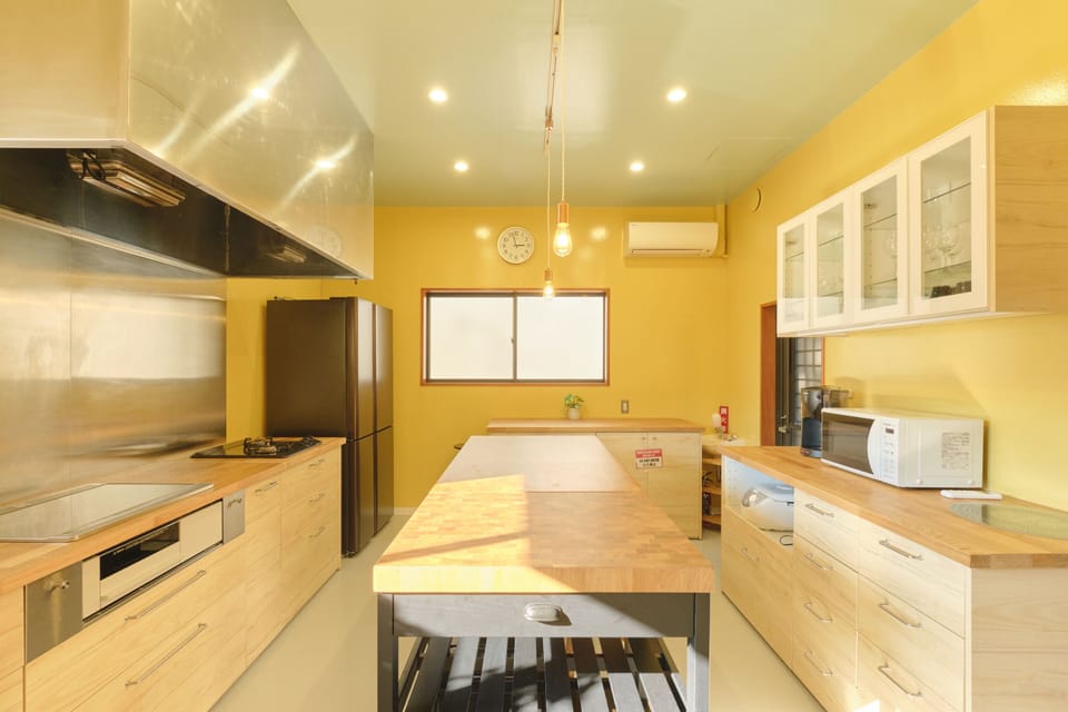 Ryokan Style Private Vacation Home | Private kitchen | Full-size fridge, microwave, stovetop, coffee/tea maker