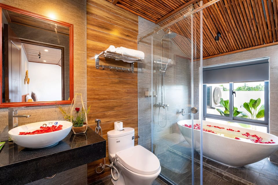 Suite, River View | Bathroom | Combined shower/tub, deep soaking tub, rainfall showerhead