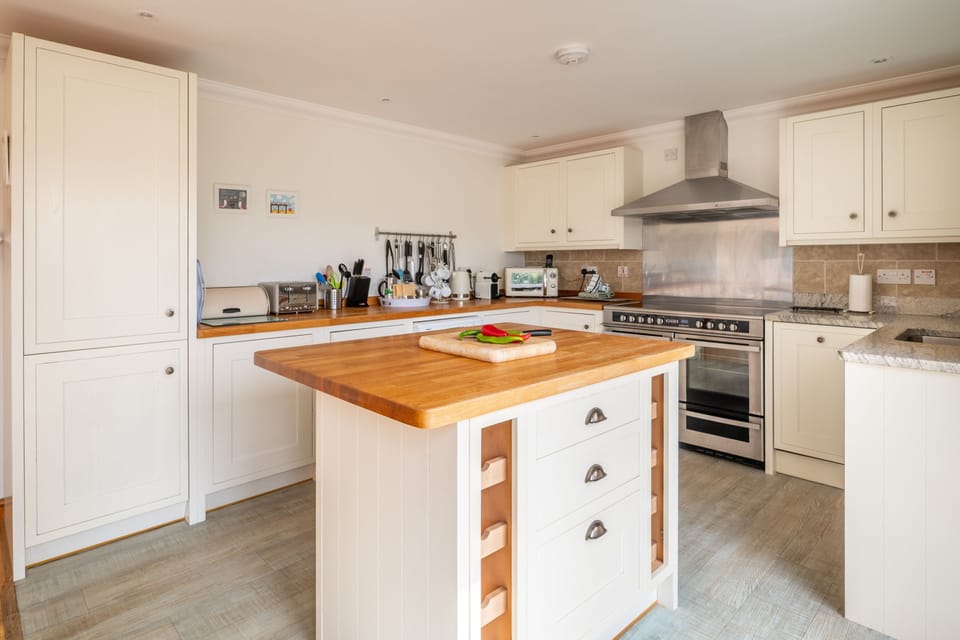 Ground floor: The kitchen has an electric range cooker and an Nespresso coffee machine