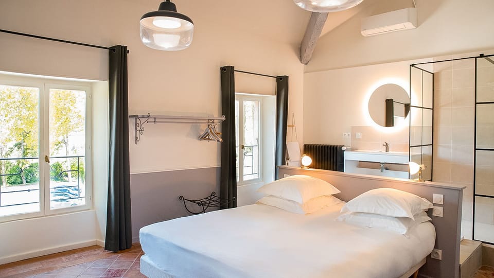 Superior Room (Saint Exupery) | Minibar, in-room safe, individually decorated, individually furnished