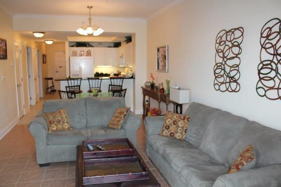 Condo, 2 Bedrooms, Balcony, Beach View (704) | Living area | Flat-screen TV
