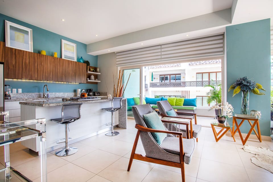 The condo has ceiling-to-floor windows to have easy access to the extended blacony and feel the breeze