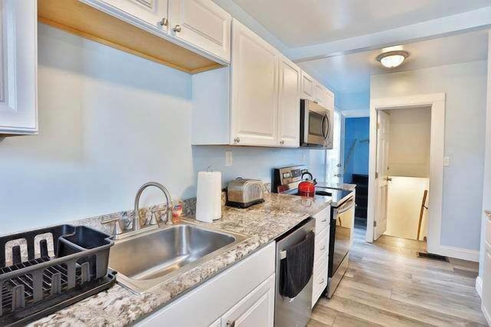 This kitchen comes fully equipped with everything you need, including modern appliances, cooking tools, and utensils, ensuring you have all the essentials to prepare your favorite meals.