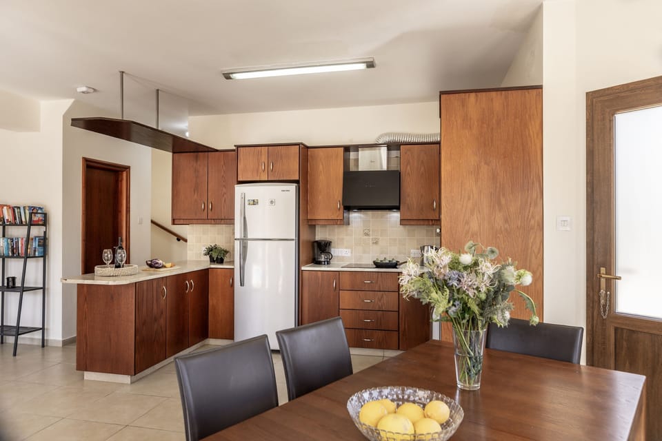 welocming kitchen and dining area
