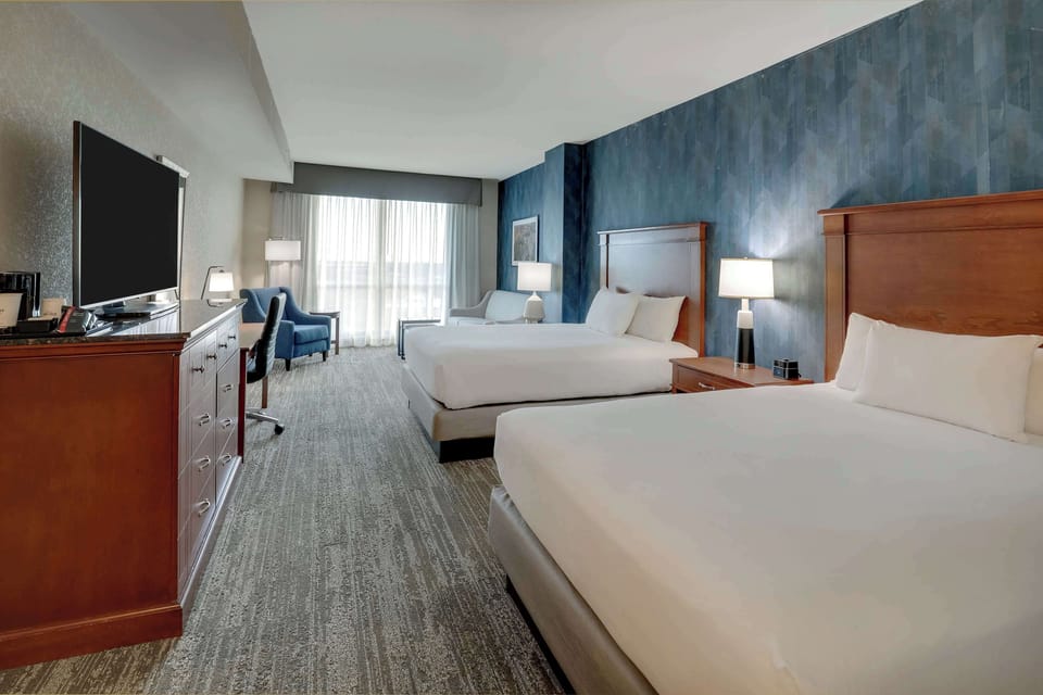 Desk, blackout drapes, iron/ironing board, cribs (free)