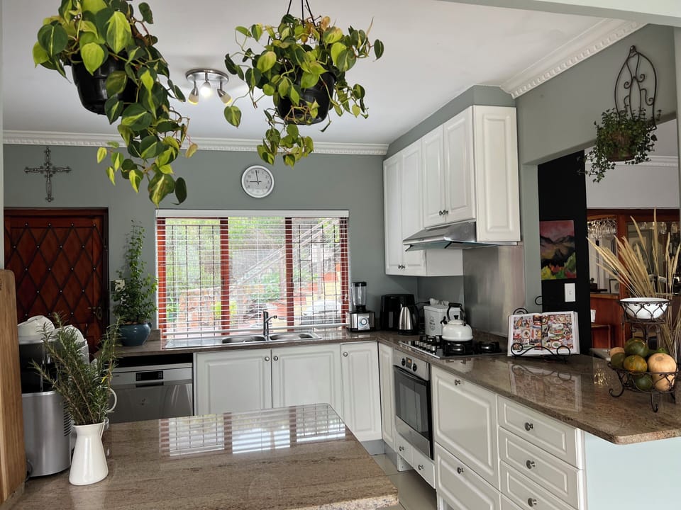 Villa | Private kitchen | Fridge, microwave, oven, stovetop