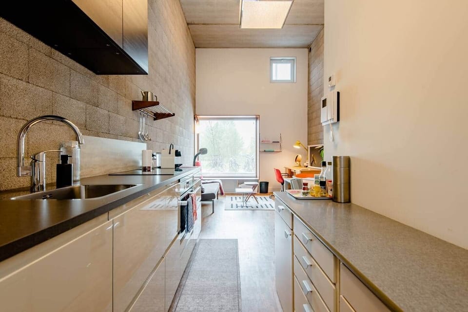 The kitchen with delicious coffee. View from the bedroom. 