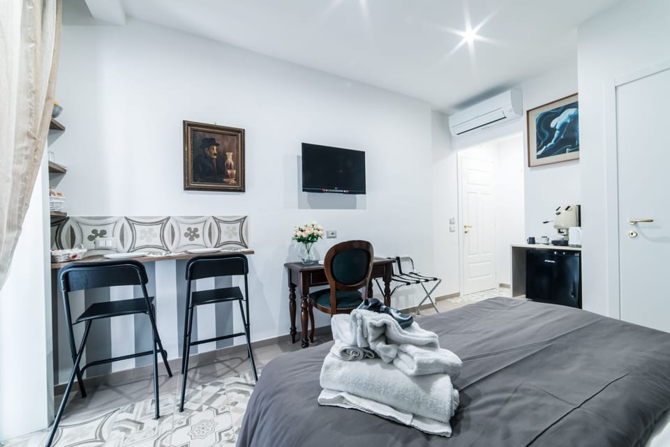 Deluxe Double Room, Balcony | In-room safe, desk, blackout drapes, free WiFi
