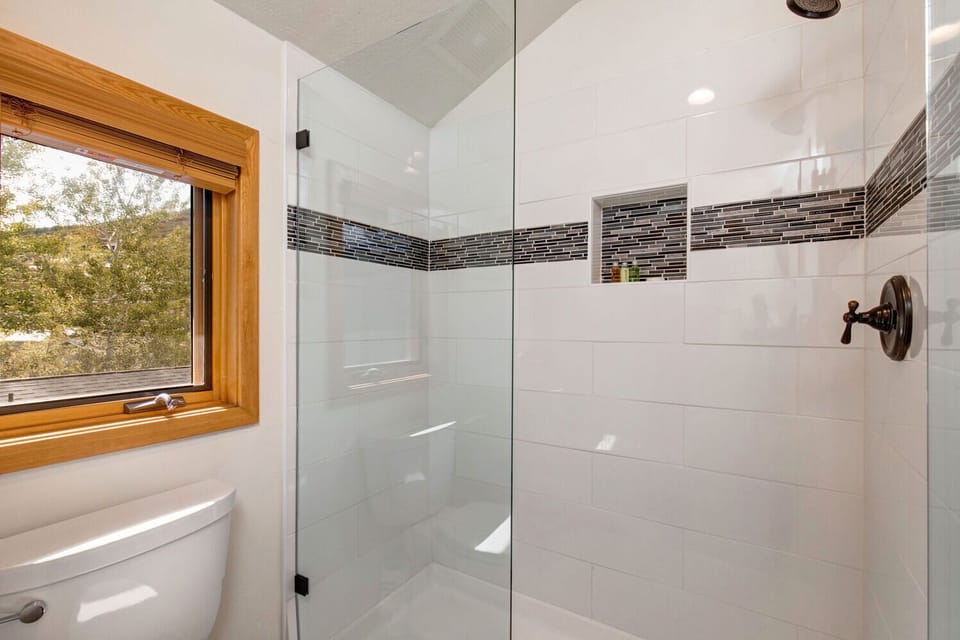 Upper Level Shared Full Bath with a Sizable Tile Shower