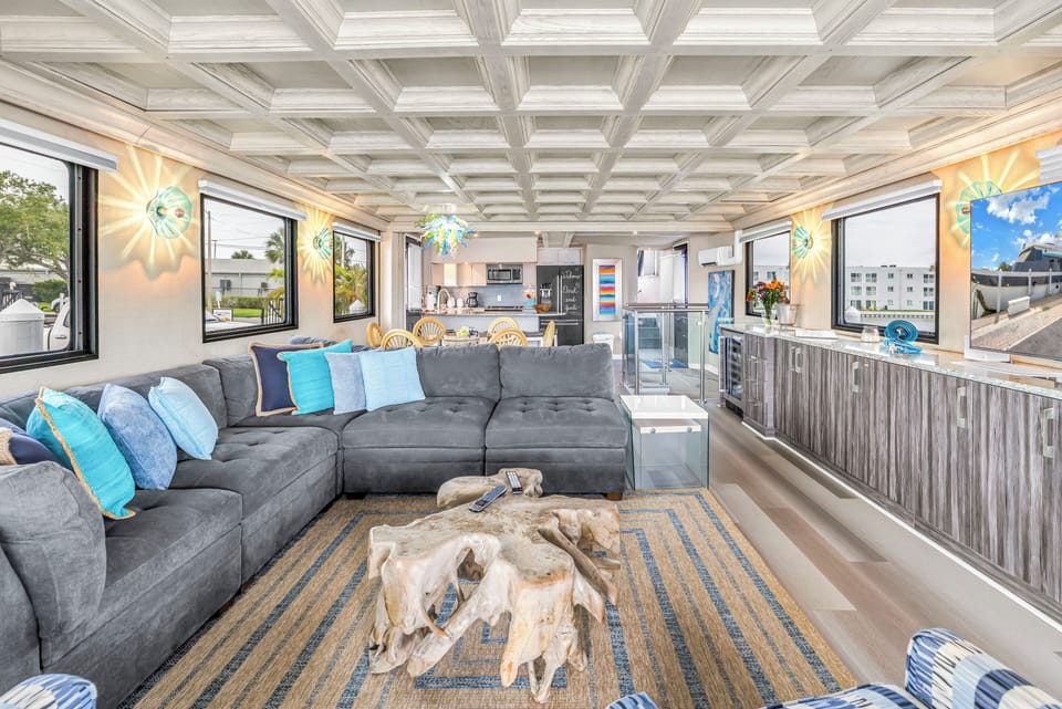 the comfortable and beautiful salon looking foward to the dining area and Galley