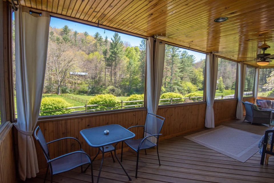 Screened in deck with seating...