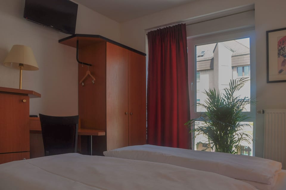 Classic Double Room | Minibar, in-room safe, desk, laptop workspace
