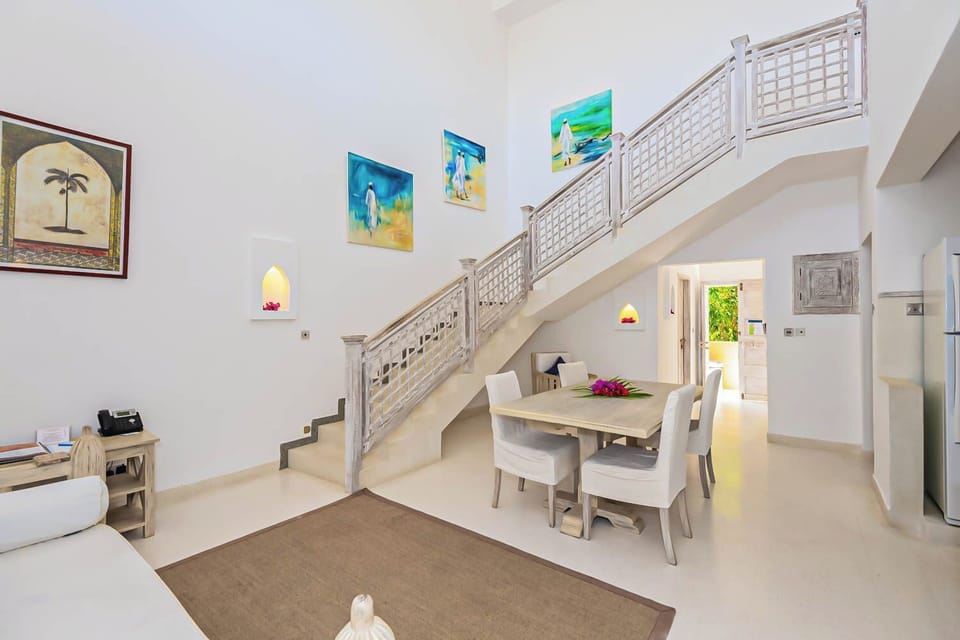 Duplex Suite | Select Comfort beds, in-room safe, laptop workspace, iron/ironing board