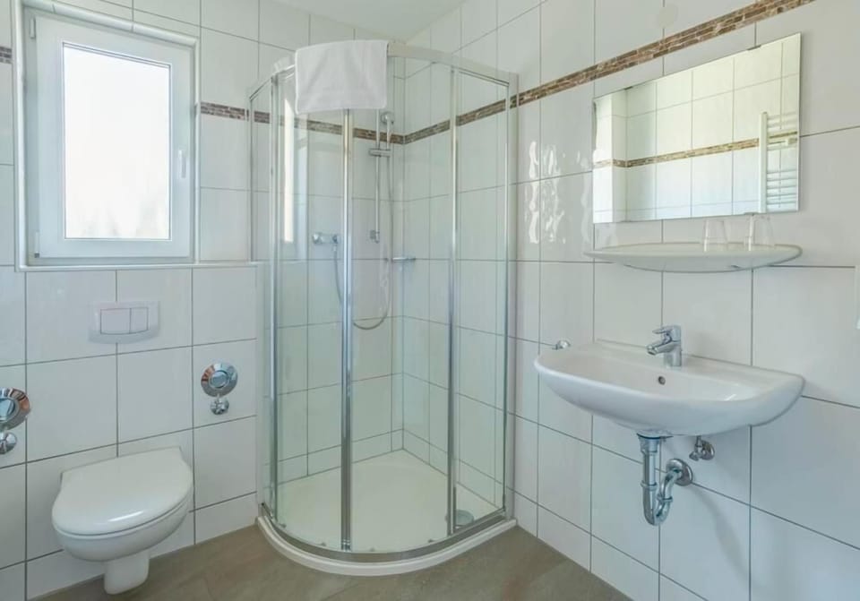 Shower, free toiletries, hair dryer, towels