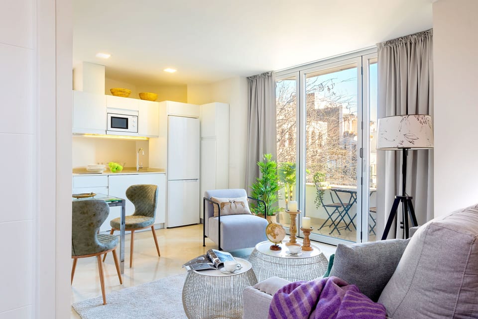 Apartment (1 Bedroom) | Living area | 32-inch TV with cable channels