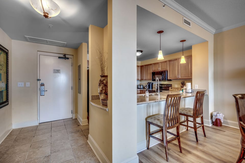 Kitchen has an eat-in bar