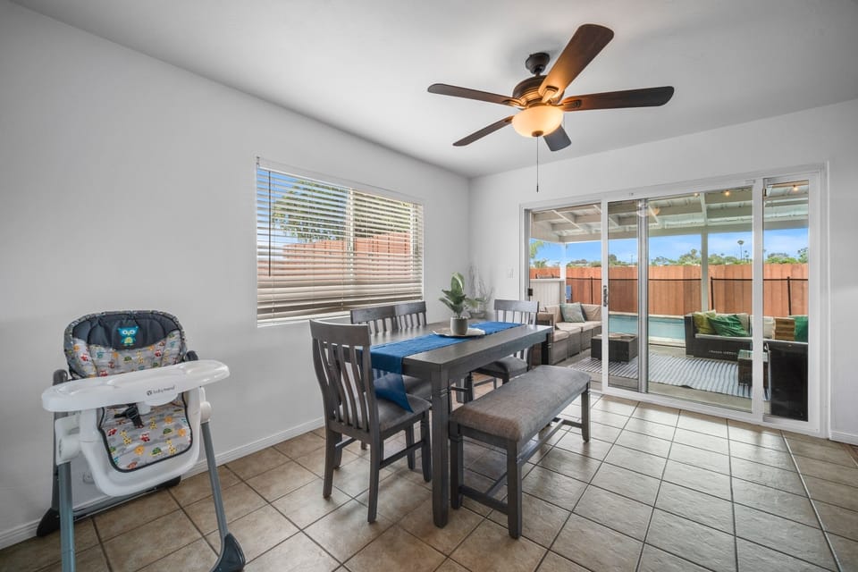 Stylish dining setup with highchair, ideal for indoor or outdoor family meals.