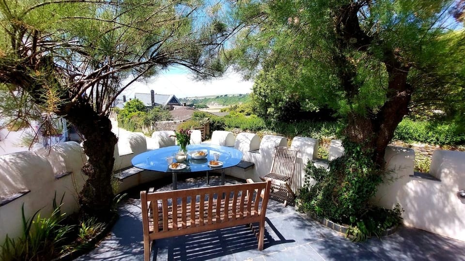 Wonderful sunny  patio garden for relaxing and al fresco dining