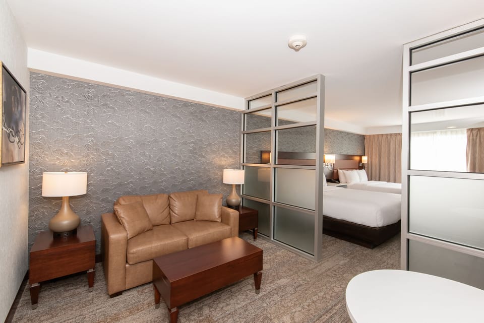 Suite, 2 Queen Beds, Non Smoking | Living area | 43-inch LED TV with satellite channels, TV