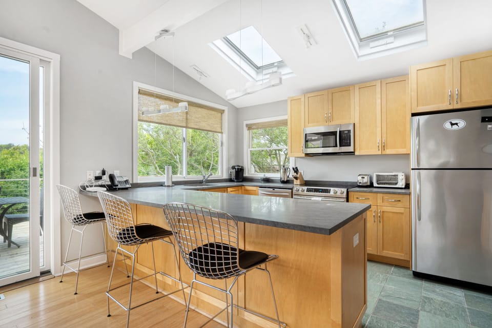Dolphin Cottage | Private kitchen | Fridge, microwave, cookware/dishes/utensils