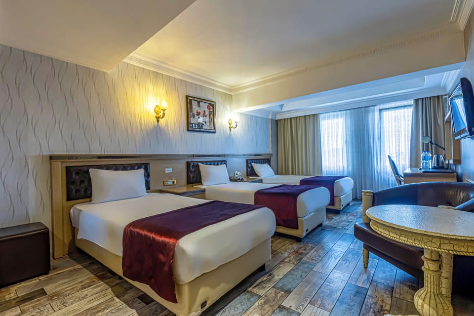 Triple Room, 3 Twin Beds | Premium bedding, minibar, in-room safe, blackout drapes