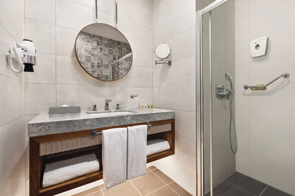 Shower, rainfall showerhead, eco-friendly toiletries, hair dryer