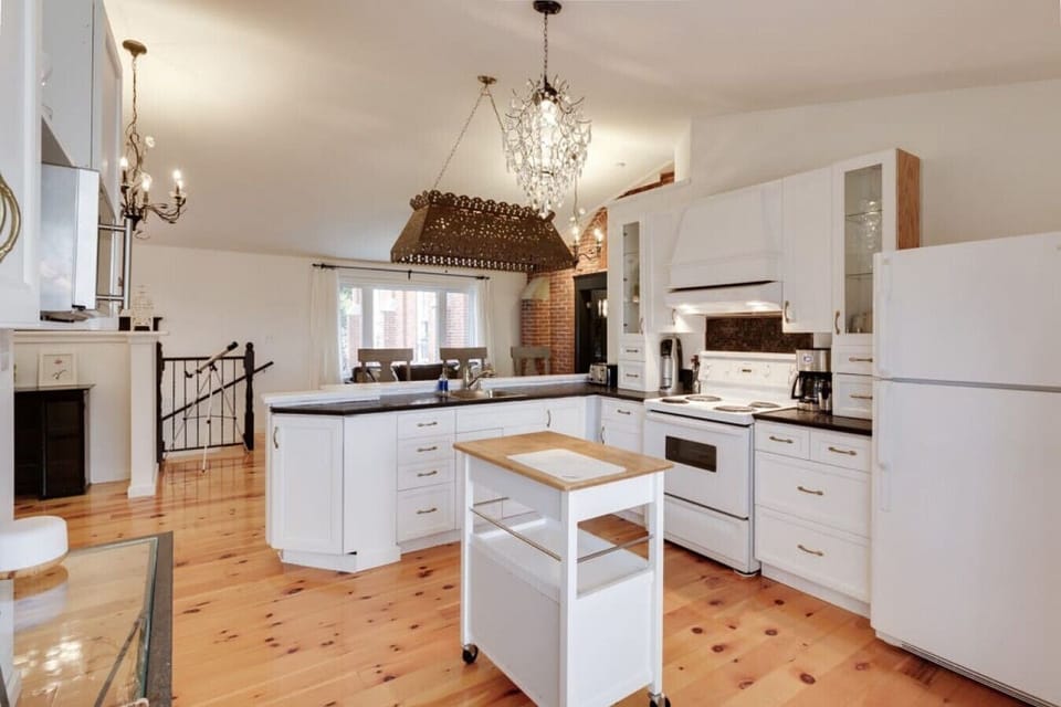 Our kitchen is fully stocked with anything you`d need for preparing a wonderful meal including pots, pans, utensils, bowls, aluminum foil, cling wrap, olive oil, coffee beans and a drip coffee maker and french press. Just bring your own creamers.
