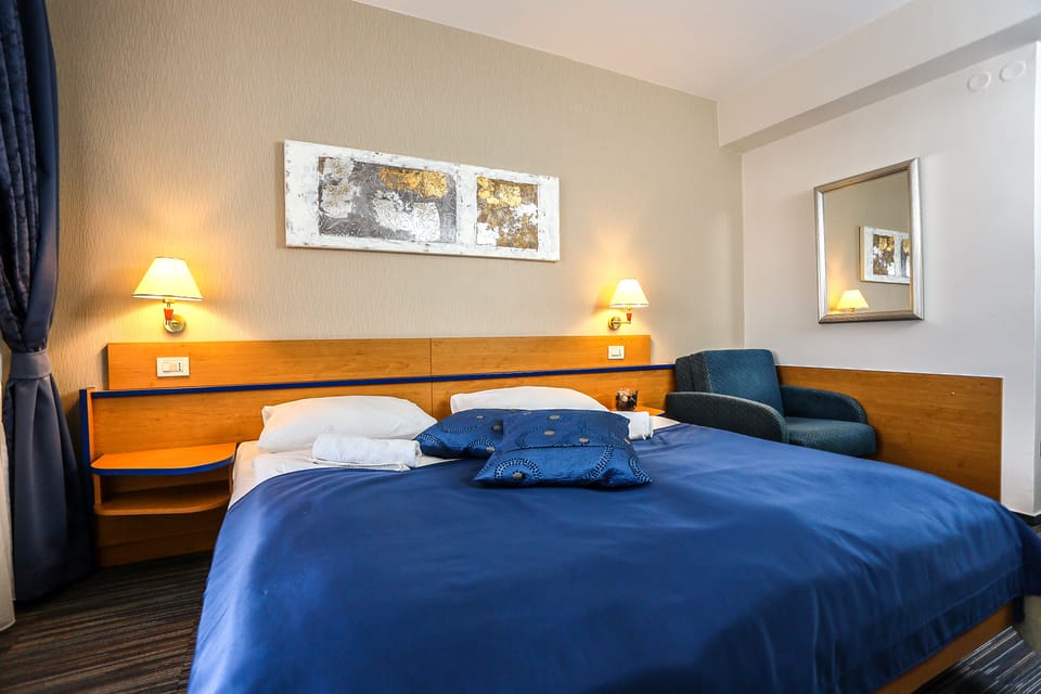 Double Room, Balcony | In-room safe, desk, free WiFi, bed sheets