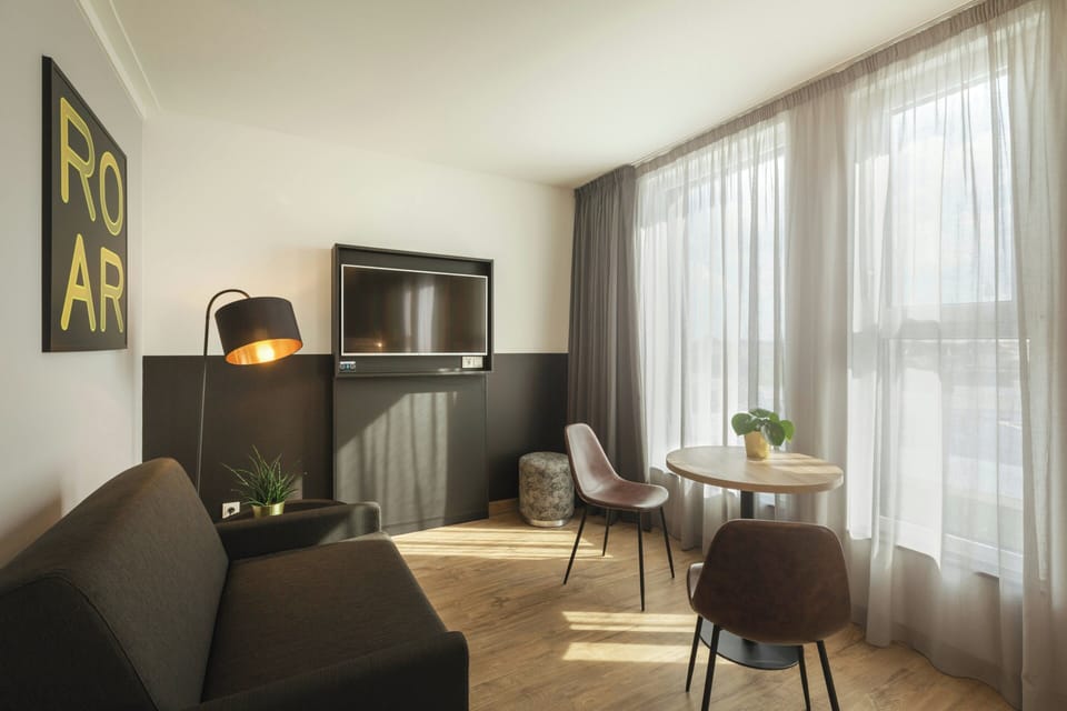 Premium Room, 1 Queen Bed with Sofa bed (Up to 3 Adults) | In-room safe, desk, laptop workspace, soundproofing