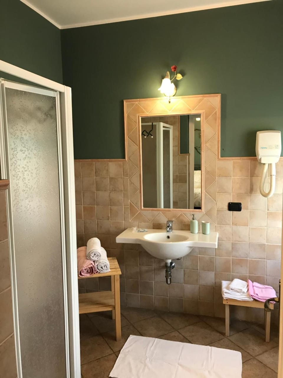 Shower, free toiletries, hair dryer, towels