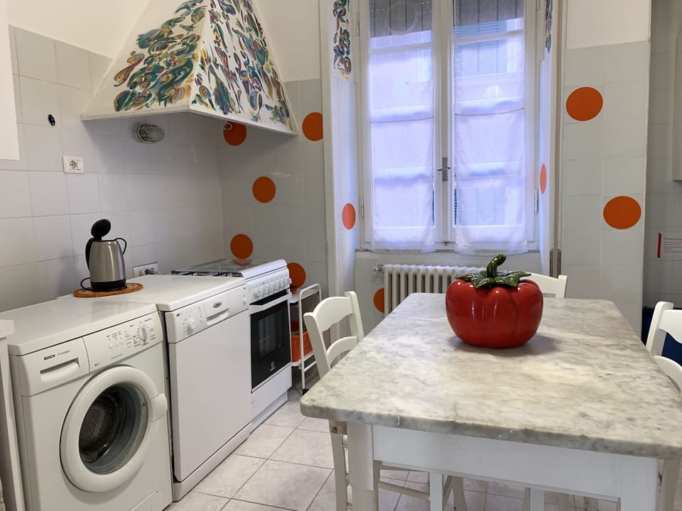 Apartment, 3 Bedrooms, Sea View (Via Gaetano Semenza 2) | Private kitchen | Full-size fridge, oven, stovetop, dishwasher