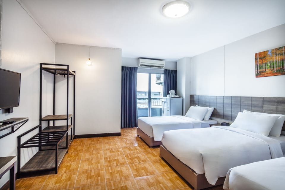 Triple Room - No Parking | Desk, laptop workspace, blackout drapes, free WiFi