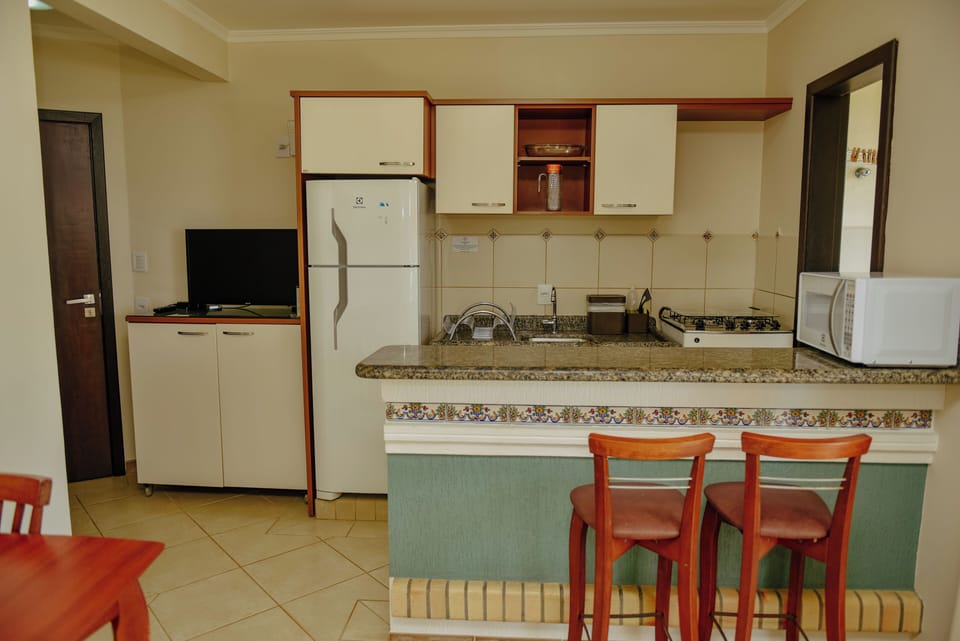 Apartment (Frente mar) | Private kitchen