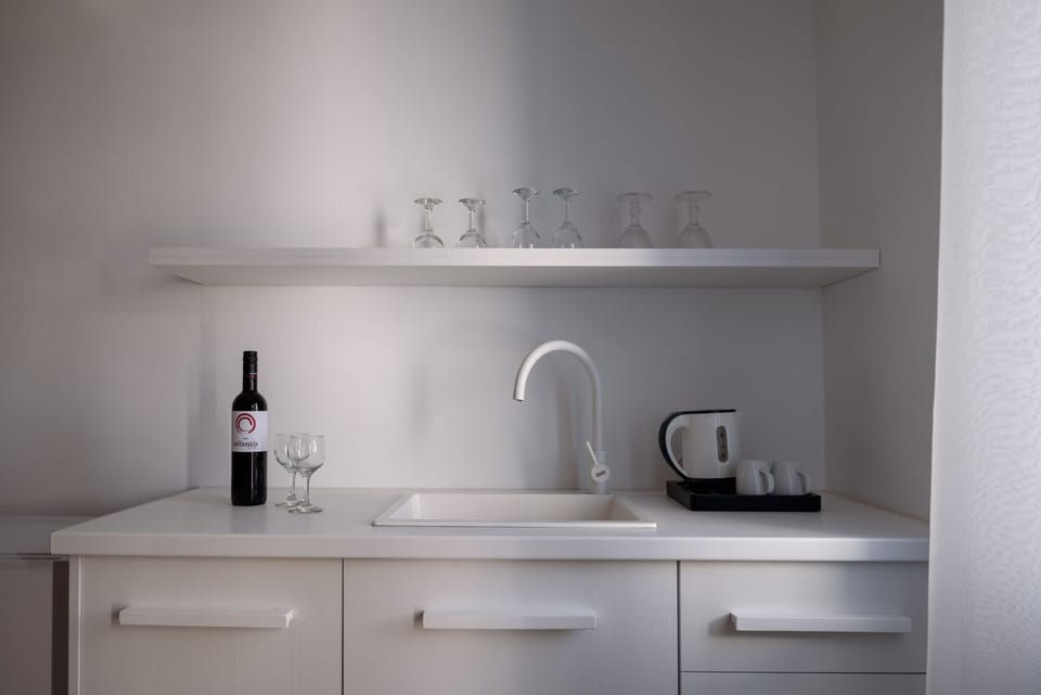 Apartment (Outdoor Hot Tub) | Private kitchen | Fridge, electric kettle