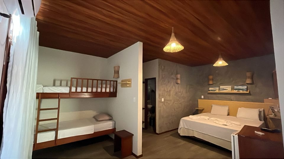 Family Room | Individually decorated, blackout drapes, bed sheets