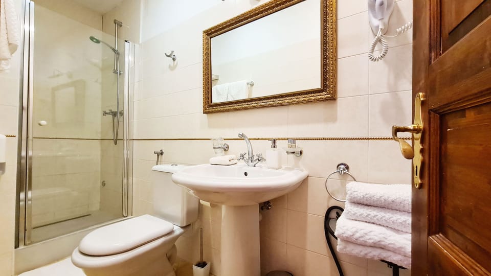 Shower, free toiletries, hair dryer, bathrobes