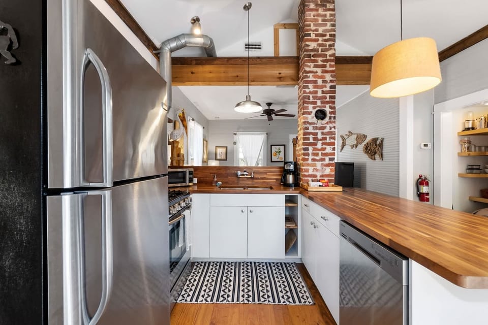 Spacious kitchen that is fully equipped and stocked with cooking essentials