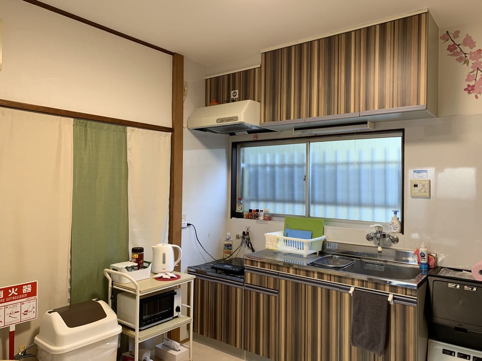Two-Bedroom Apartment | Private kitchen | Mini-fridge, microwave, stovetop, electric kettle