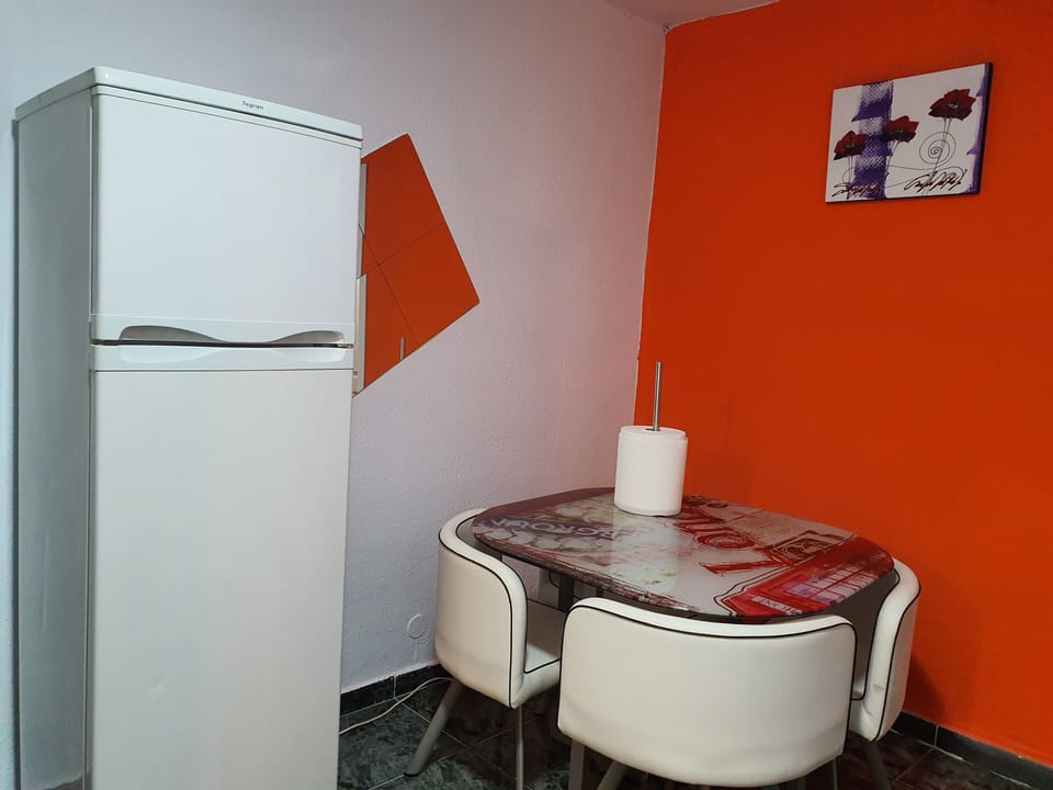 Double Room, Shared Bathroom | Living area | Flat-screen TV