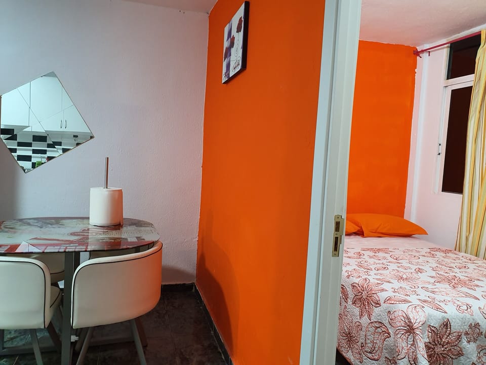 Double Room, Shared Bathroom | Living area | Flat-screen TV