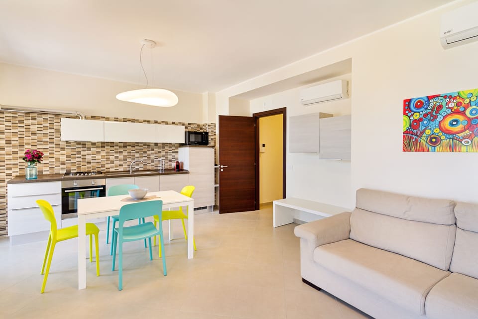 Apartment, 1 Bedroom | Living area | Flat-screen TV