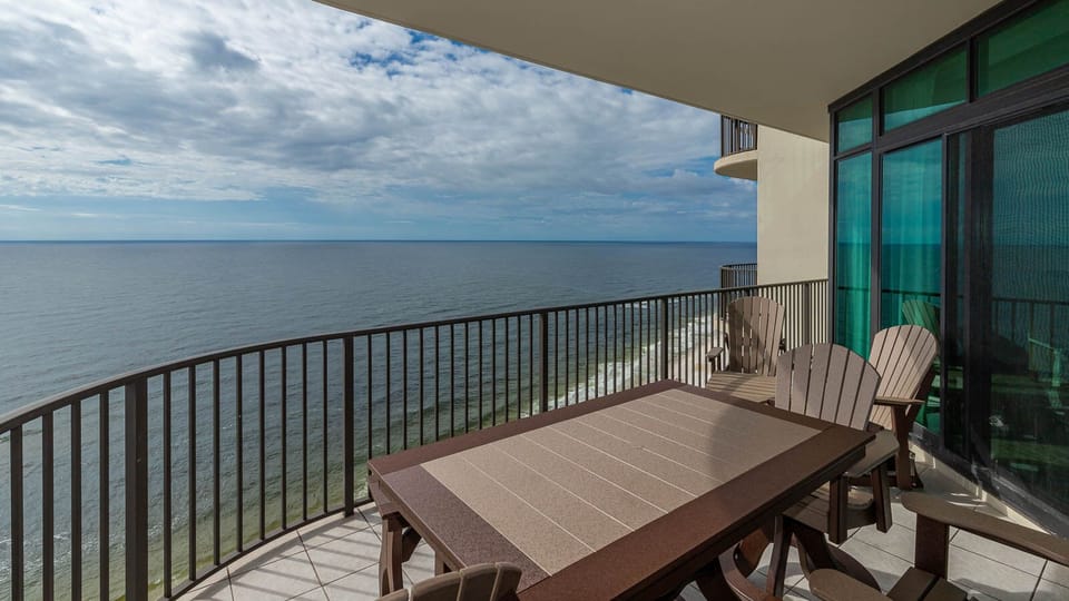 Watch the coastline stretch into the distance and the horizon meet the sky from your balcony while you soak up the sun