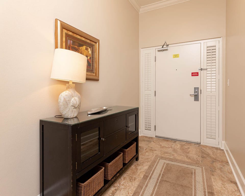Welcome to your vacation home with a warm vibe, where shell decor and soft lighting set a relaxing tone for beach adventures