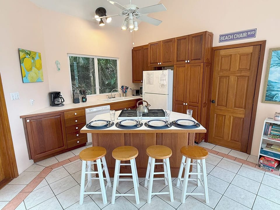 Your well equipped kitchen includes 4 bar stools - a perfect place to enjoy your breakfast