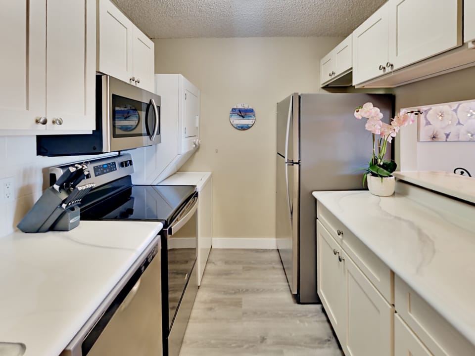 Kitchen - Fully stocked kitchen with stainless steel appliances