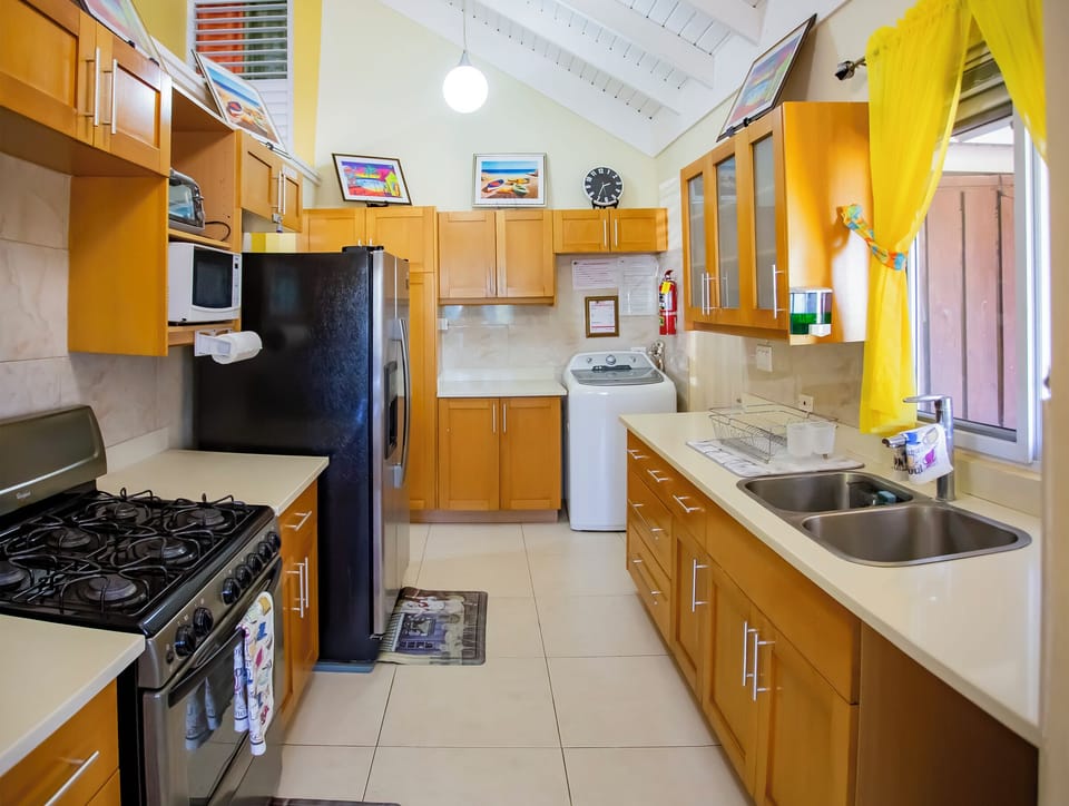 Fully equipped kitchen with utensils. 
Also washing machine (at a cost)