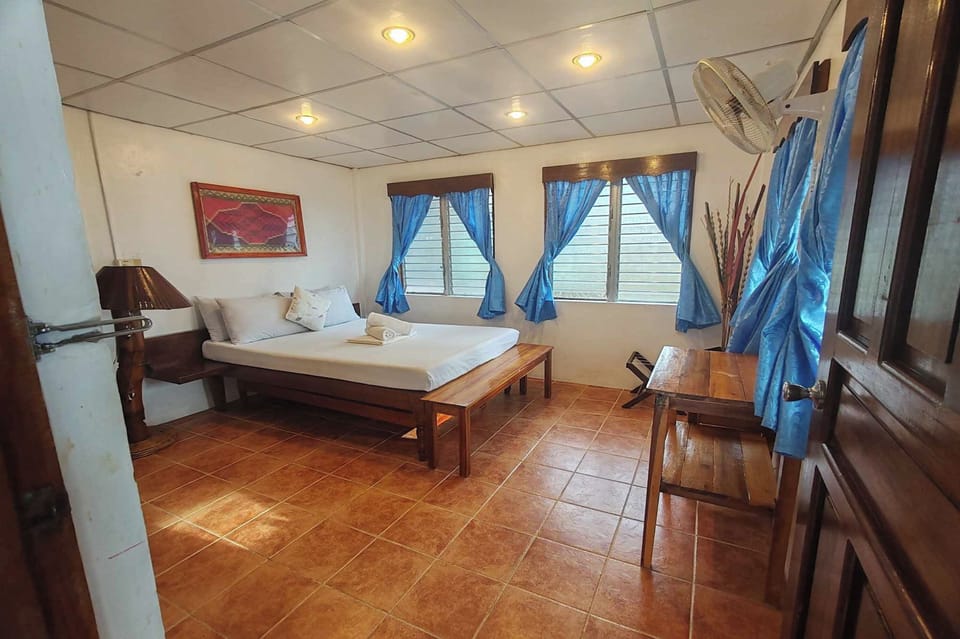 Superior Double Room, Beachfront | Desk, iron/ironing board (on request), bed sheets